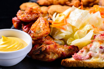 hot sandwiches on a dark background, set of snacks