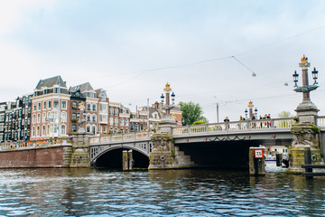 Amsterdam, Netherlands September 5, 2017: Bridge and Amstel river.