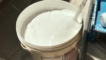 White Color paint stirring