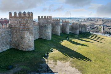 Fototapeta na wymiar Avila (Castile and Leon, Spain): the famous medieval walls that surround the city. UNESCO World Heritage Site