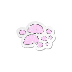 retro distressed sticker of a pink clouds
