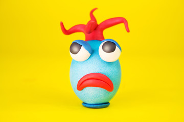 Easter Egg Cartoonish Character With Plasticine Eyes, Mouth and Hair Having an Expressive Face