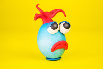 Easter Egg Cartoonish Character With Plasticine Eyes, Mouth and Hair Having an Expressive Face