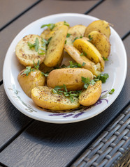  potatoes with herbs sprinkled with green parsley