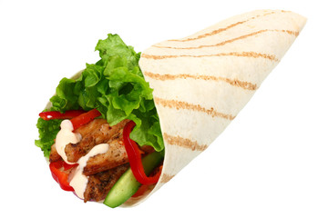 Tortilla wrap with fried chicken meat and vegetables isolated on white background. fast food