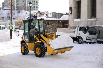 除雪車　作業員　雪