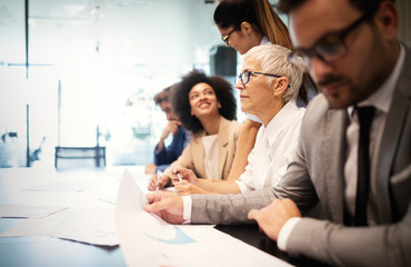 Creative business people working on business project