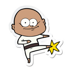 sticker of a cartoon bald man karate kicking
