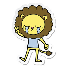 sticker of a crying cartoon lion