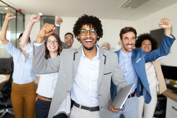 Portrait of business team posing in office