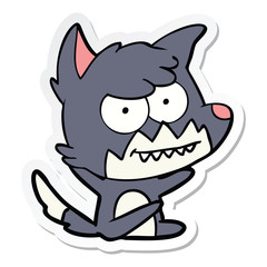 sticker of a cartoon grinning fox