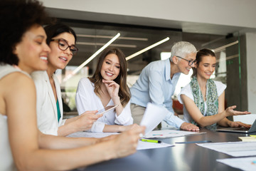 Creative business people working on business project