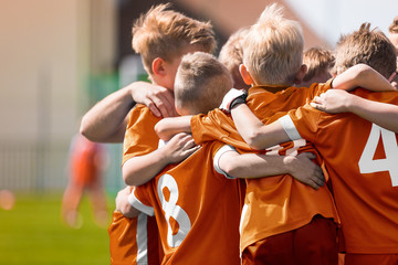 Boys Soccer Football Team Huddle. Children Play Sports Game. Kids Sporty Team United Ready to Play...