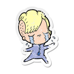 distressed sticker of a cartoon crying girl wearing space clothes