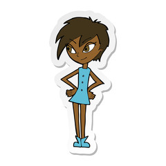 sticker of a cartoon girl with hands on hips