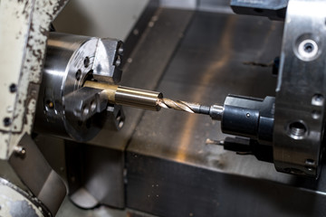 metal blank machining process on lathe with cutting tool