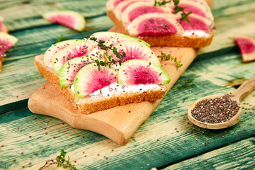 Healthy breakfast toasts from sliced watermelon radish