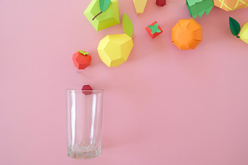 exotic fruits made of paper on pink background
