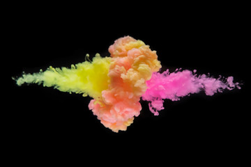 Coloured acrylic ink mixing in water on black