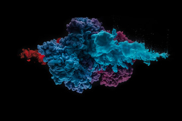 Coloured acrylic ink mixing in water on black