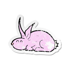 retro distressed sticker of a cartoon rabbit