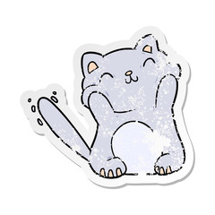 distressed sticker of a cartoon cat