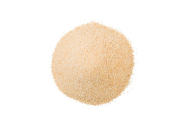 dried milled ground garlic heap isolated on white background. top view