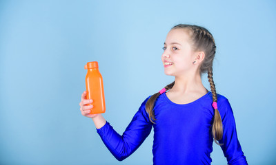 Water balance and hard gym training. Drink more water. Keep water bottle with you. Quench thirst. Child feel thirst after sport training. Kid cute girl gymnast sports leotard hold bottle for drink