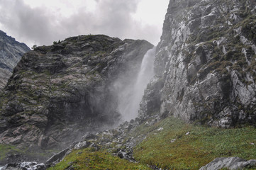 Fototapeta na wymiar Waterfall scenes in mountains, national park Dombai, Caucasus, Russia, Europe
