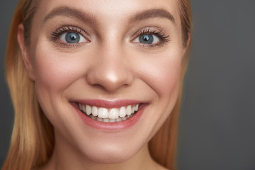 Close up portrait of excited woman with natural makeup