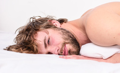 Man attractive macho relax and feel comfortable. Simple tips to improve your sleep. Total relax concept. Man unshaven bearded face sleep relax or just wake up. Guy bearded macho relax in morning