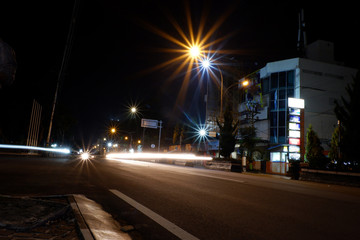 Fototapeta na wymiar Artistic style dark defocused and blured lights of night in the city