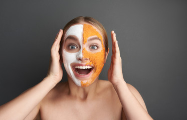 Excited woman smiling and putting her hands up