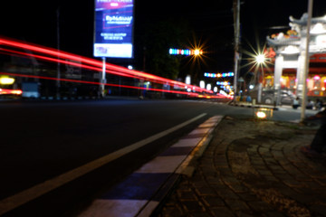 Fototapeta na wymiar Artistic style dark defocused and blured lights of night in the city