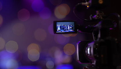 Fototapeta na wymiar Soft and Blur focus camera show viewfinder image catch motion in interview or broadcast wedding ceremony, Video Cinema From camera. video cinema production on Bokeh background