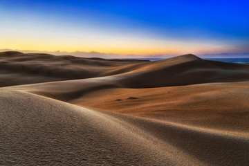 Fototapeta na wymiar Dunes Cold Morning Sea Rise