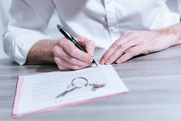 Real estate contract signature (Lorem ipsum text used)
