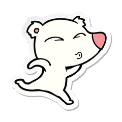 sticker of a cartoon whistling polar bear