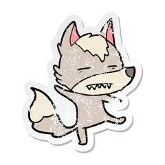 distressed sticker of a cartoon wolf showing teeth