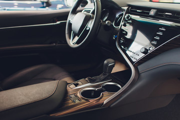 Fototapeta na wymiar Interior view of car with black salon. steering wheel, auto