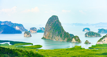 Stunning view of the beautiful Phang Nga Bay with the sheer limestone karsts that jut vertically...