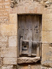 Door in a house of a village of castile and lion, viniegra from below