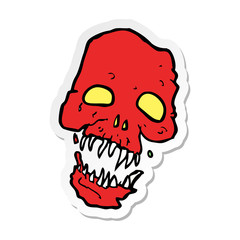 sticker of a cartoon scary skull