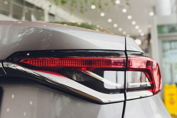 Close up projector Taillight of the modern and elegant car, automotive part concept.