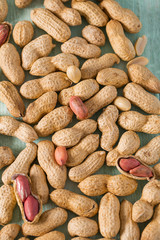 peanuts on wooden surface