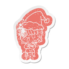 cartoon distressed sticker of a woman wearing santa hat