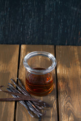 vanilla extract on wooden surface