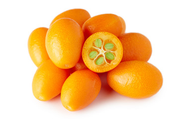 Kumquats or cumquats (Citrus japonica) isolated on white background