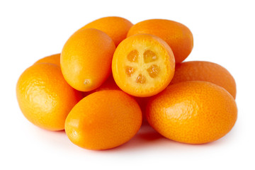 Kumquats or cumquats (Citrus japonica) isolated on white background
