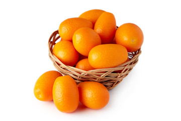 Kumquats or cumquats (Citrus japonica) isolated on white background